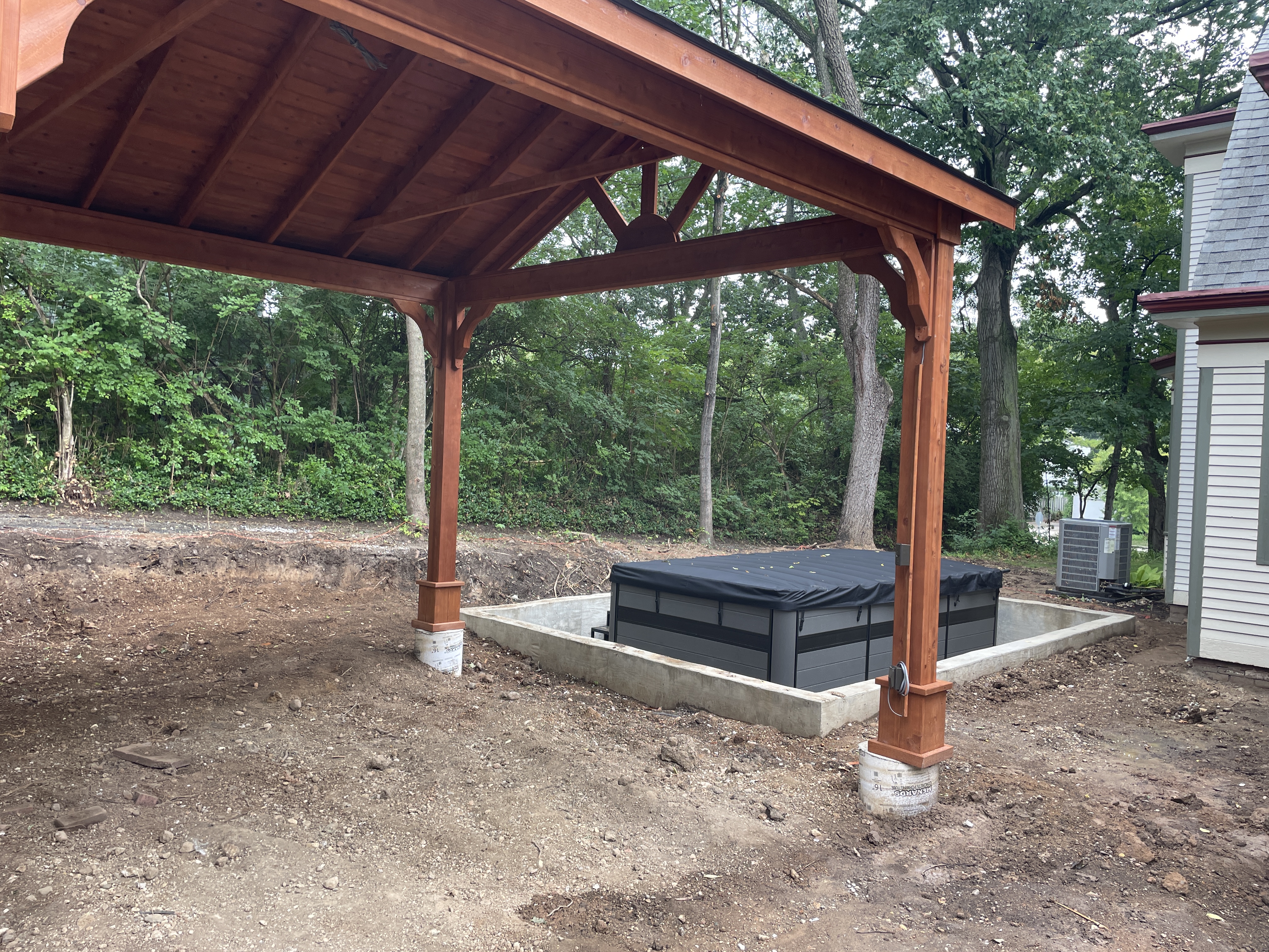 Recessed swim spa install underway in a Lafayette backyard