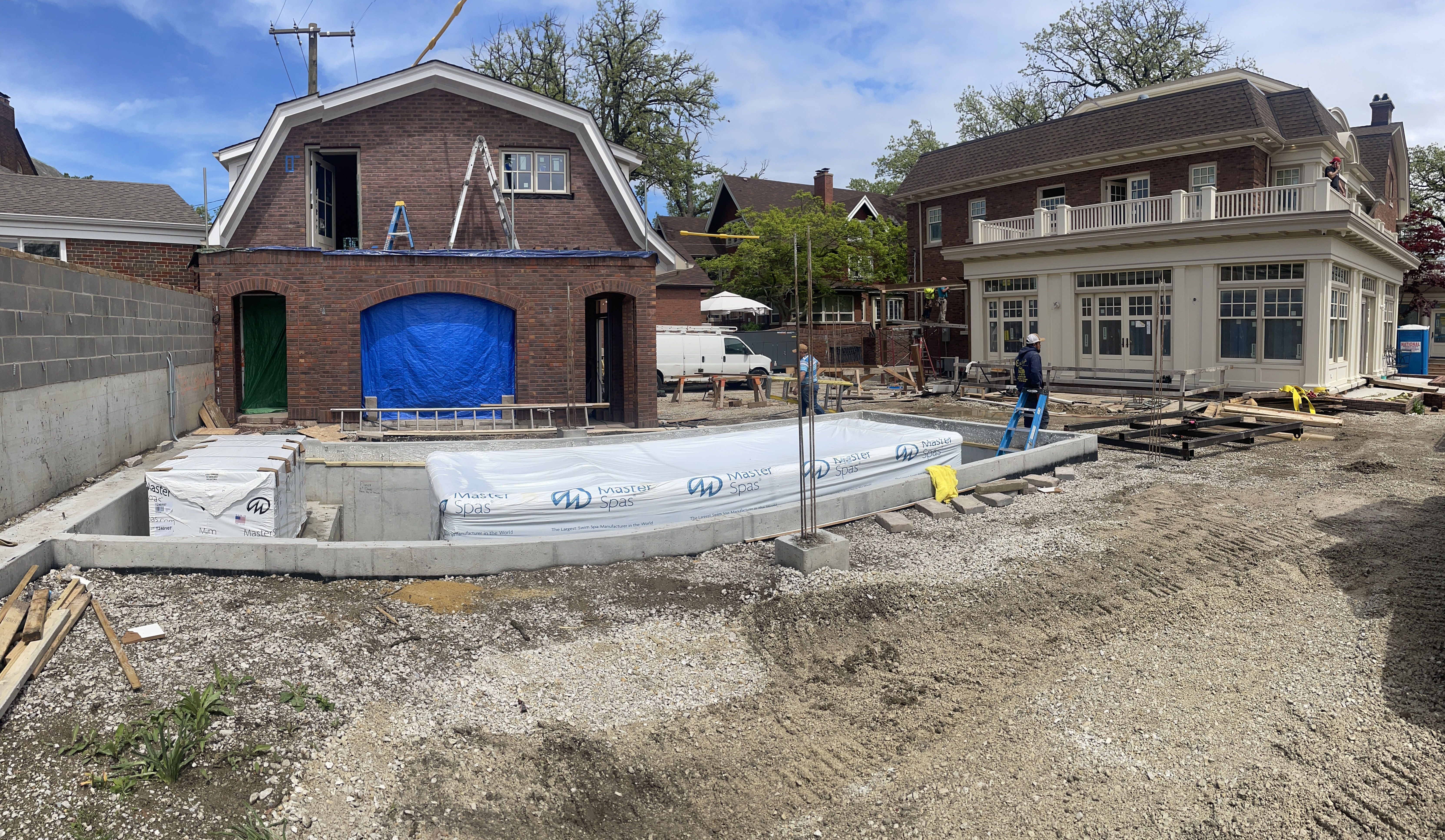 Swim spa and cold tub delivery at a customer construction site