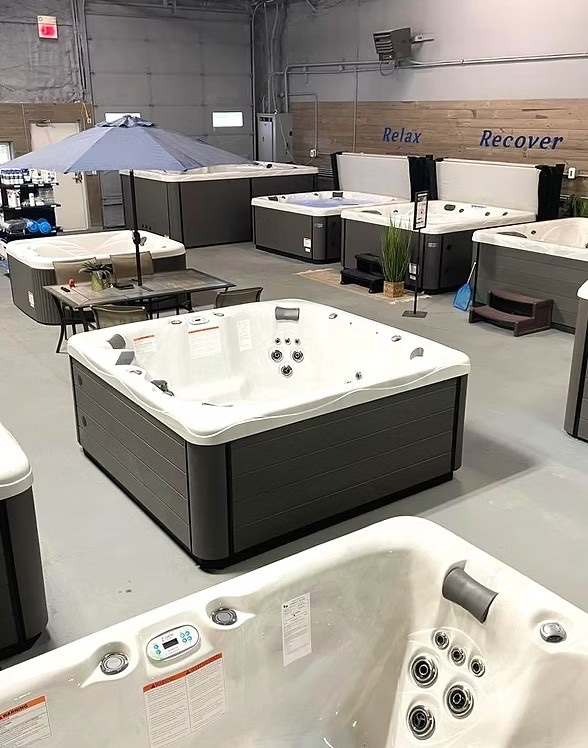 Healthy Living Spas Mahomet showroom with hot tubs on display